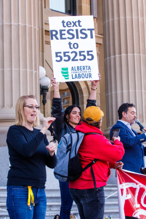 Speakers at a protest on the steps of the Alberta Legislature